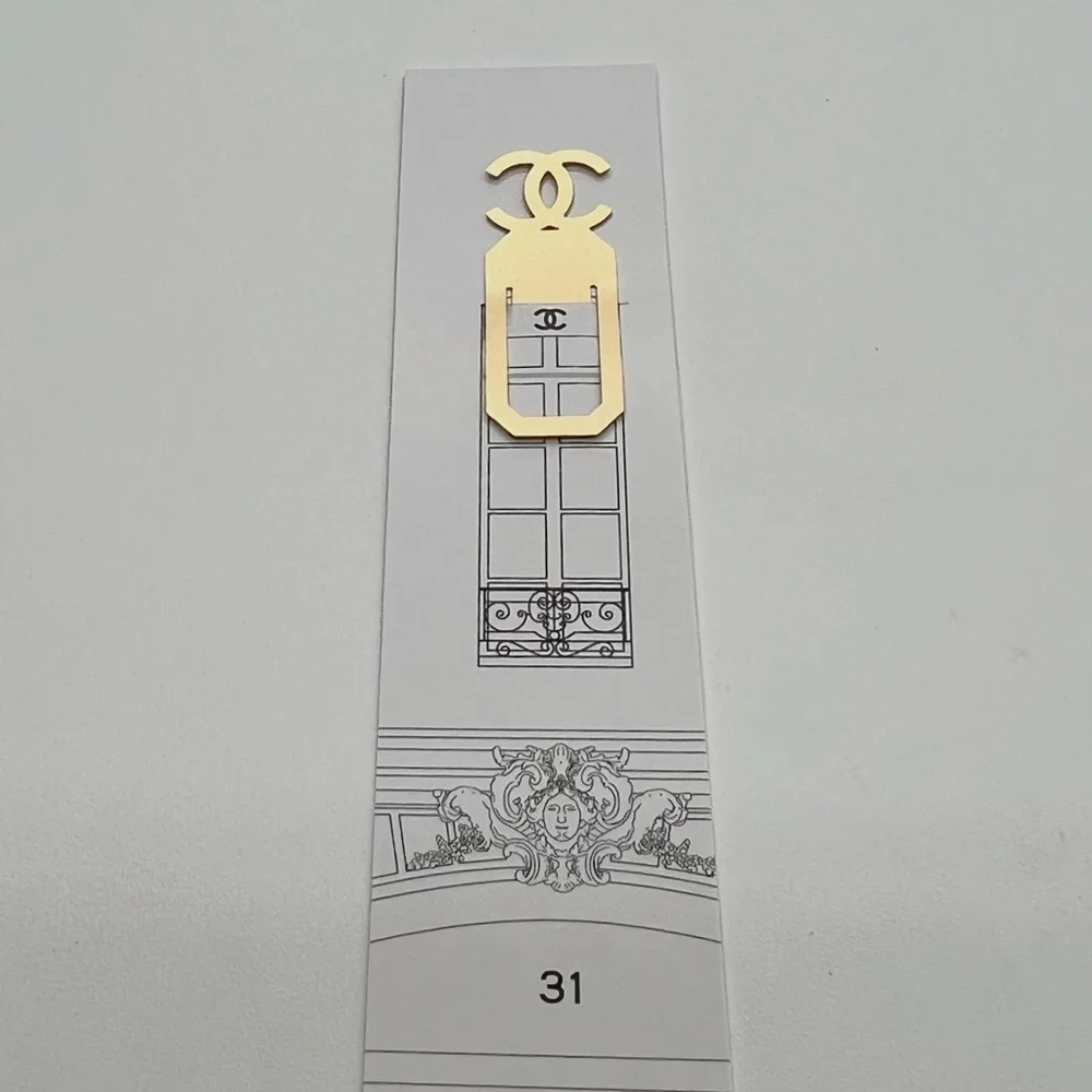 New CHANEL Gold Logo Bookmark